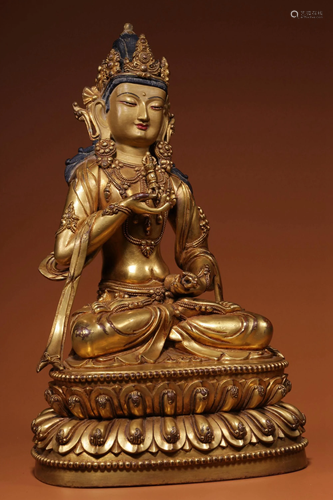 A GILT-BRONZE FIGURE OF VAJRASATTVA.MING PERIOD