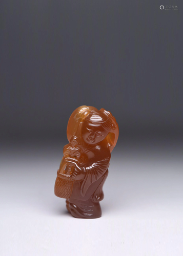 A CARVED AGATE FIGURE .QING PERIOD