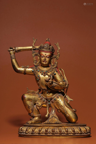 A GILT-BRONZE FIGURE OF ACALANATHA.QING PERIOD