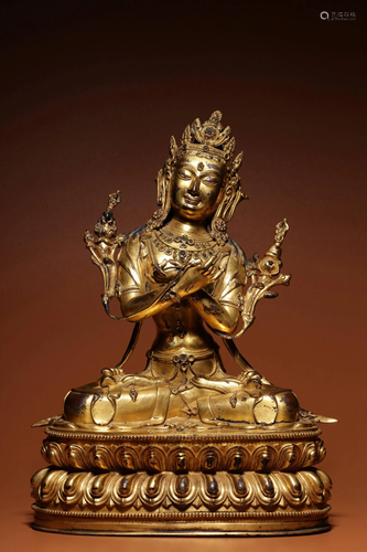 A GILT-BRONZE FIGURE OF VAJRASATTVA.MARK OF YONGLE