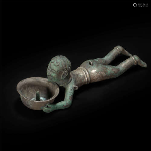 Silver lamp in human form from Tang