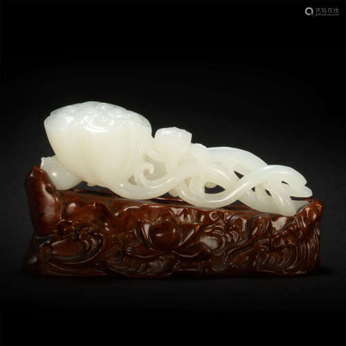 Hetian jade ornament in lotus form from Qing