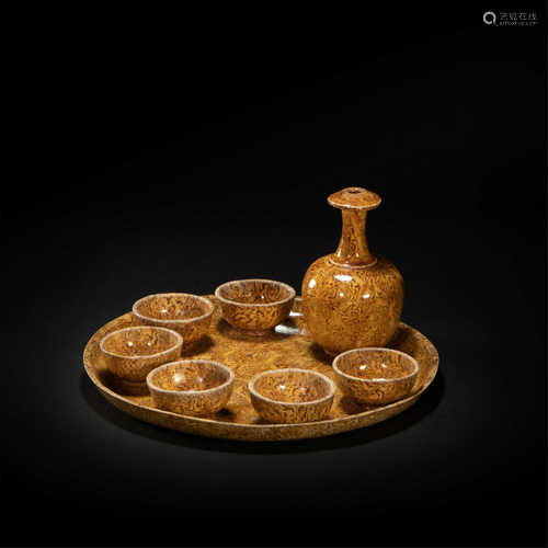 Yellow glazed twisted porcelain wine set from Tang