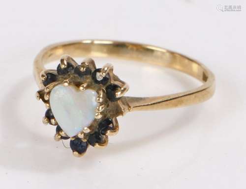 9 Carat Gold ring with an opal stone, ring size M