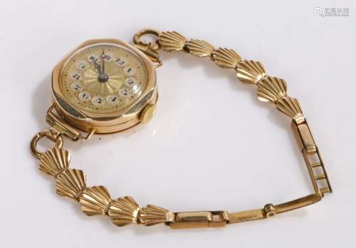 9 Carat gold wristwatch,with gold dial and Arabic numerals a...