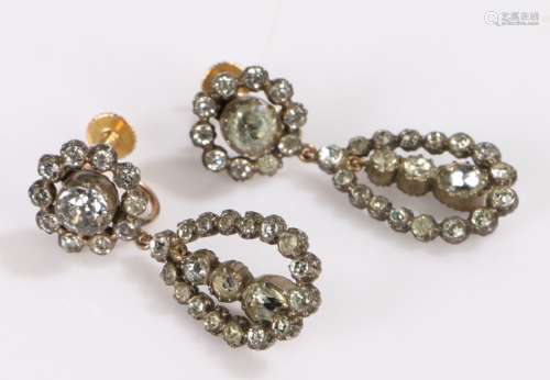 Pair of early 20th Century paste set earrings, with arched d...