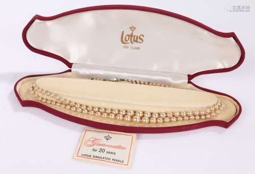 Set of Lotus Simulated pearls housed in a case