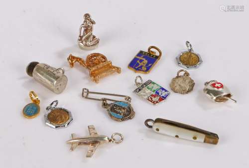 Collection of white metal pendants to include themes of plan...