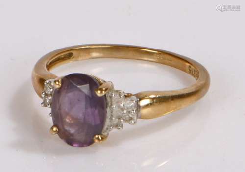 9 Carat gold ring set with a amethyst stone size K, gross we...