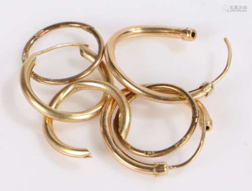 Three pairs of 9 carat gold hoop earrings, 1.9g
