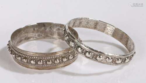 Two Indian white metal bangles, gross weight 120.5g