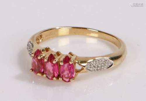 9 Carat gold ring set with 3 pink stones ring size N, gross ...