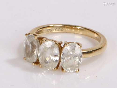 9 carat gold ring set with three paste stones ring size k, g...