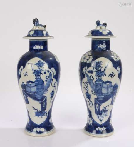 Pair of Chinese vases and covers, each lid mounted with a do...