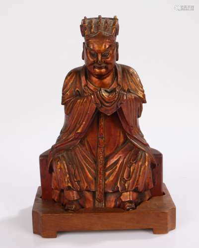 Chinese carved figure, Qing dynasty, in gilt and red lacquer...
