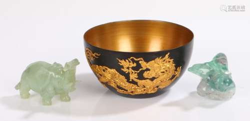 Chinese black lacquered bowl, overlaid with a gilt dragon, t...