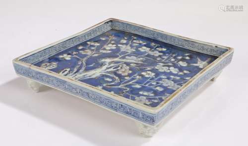 Chinese porcelain stand, the square stand with a tree in blo...