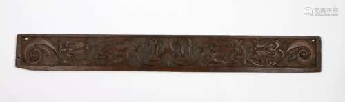 17th Century carved oak panel, with stylised tulips and scro...