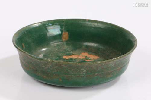 Green glaze dish, the glaze with a line decoration to the in...
