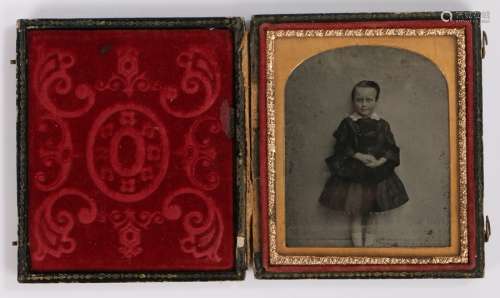 19th Century sixth plate ambrotype, of a boy in dress, house...