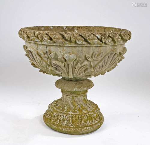 Composite garden urn, with a ribbon and scroll body above th...