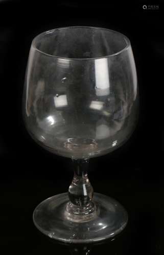 Very large and decorative wine glass, the bowl above the ste...