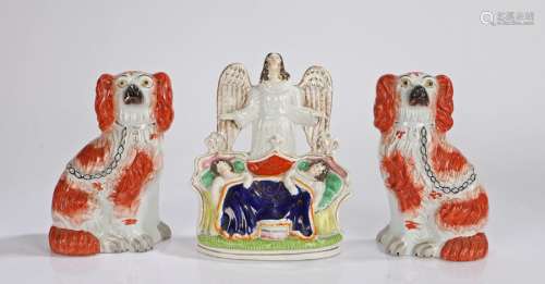 Pair of 19th Century Staffordshire spaniels, 22cm high, toge...