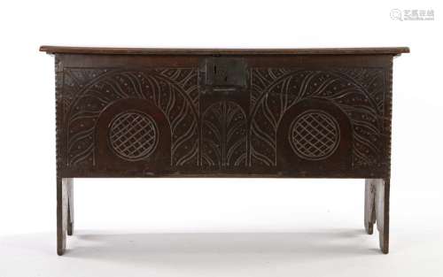 17th Century oak coffer, the rectangular top with chip carve...