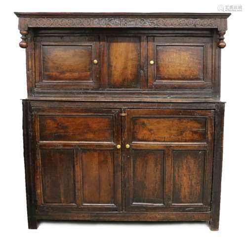 18th Century dated oak Court Cupboard, the shallow cornice a...