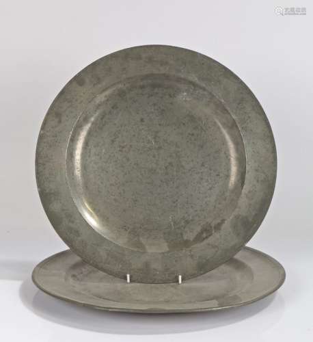 Two pewter chargers, the first stamped Edgar & Son , 38cm wi...