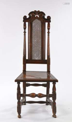 17th Century fruitwood chair, the arched top rail with scrol...