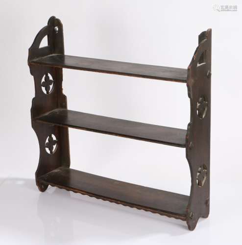Victorian Gothic revival mahogany hanging shelves, with thre...