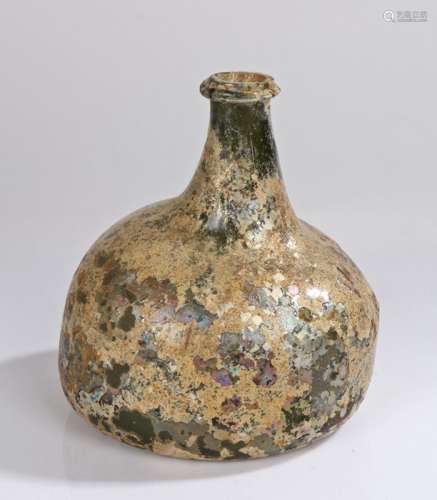 Early 18th Century green glass 'onion' wine bottle, circa 17...