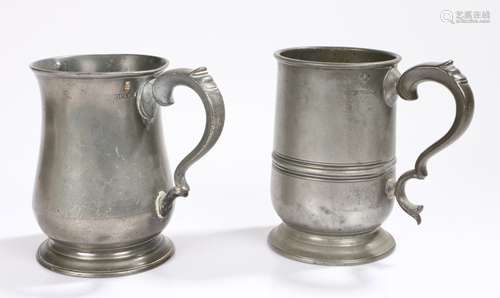 Two pewter quart tankards, the first Victorian tankard with ...