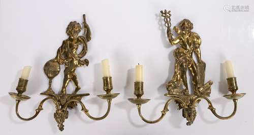 Pair of Regency gilt bronze wall lights, with one figure hol...