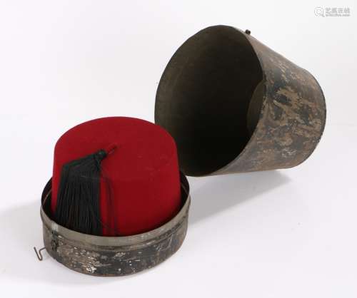 19th Century tin fez hat box, with a hinged lid and tapering...