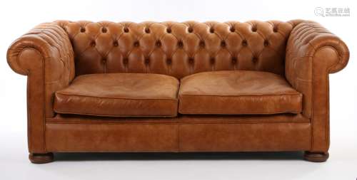 Leather Chesterfield settee, with a button back and sides ab...