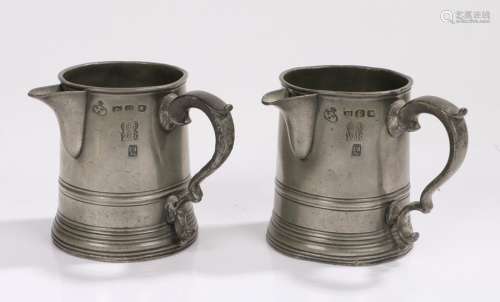 Pair of William IV pewter half pint spouted tankards, with o...
