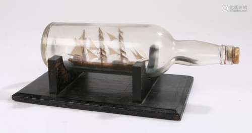 Early 20th Century ship in a bottle, the bottle enclosing th...