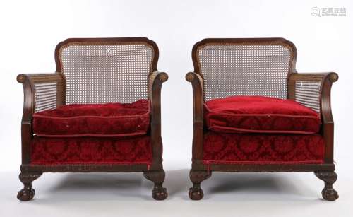 Pair of early 20th Century mahogany and caned bergere chairs...