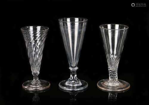Three George III Ale glasses, to include two wrythen pattern...