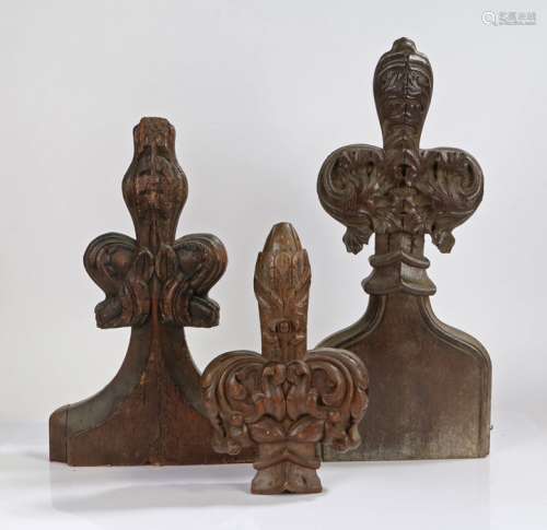 Three pew end terminals, the first a 17th Century example wi...