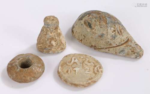 Four lead weights, to include three medieval examples and a ...