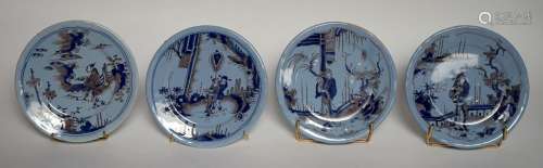 尼弗斯，17世纪末18世纪初。一套四件的陶盘，蓝底山水汉字上有蓝色和...