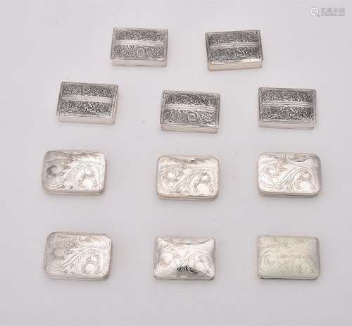 A collection of silver rectangular boxes