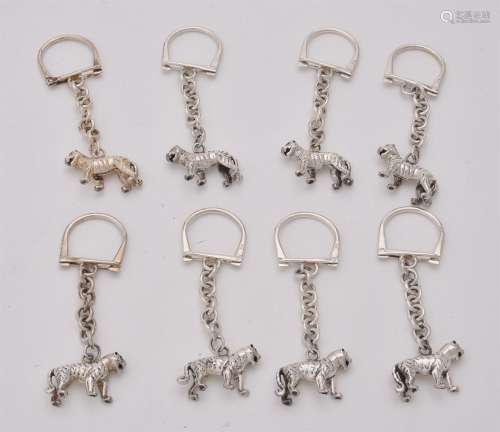 Eight silver tiger key rings