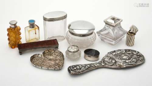 A collection of silver and silver mounted dressing table ite...