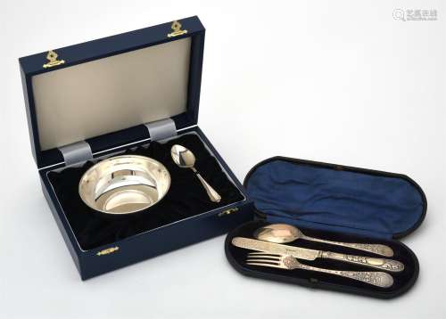 A cased silver christening bowl and spoon by W. I. Broadway ...