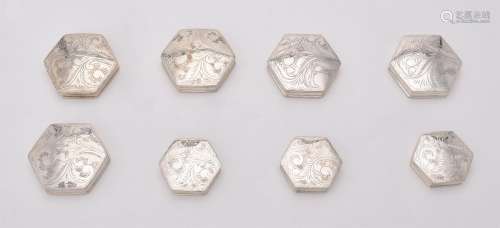 A collection of silver octagonal boxes