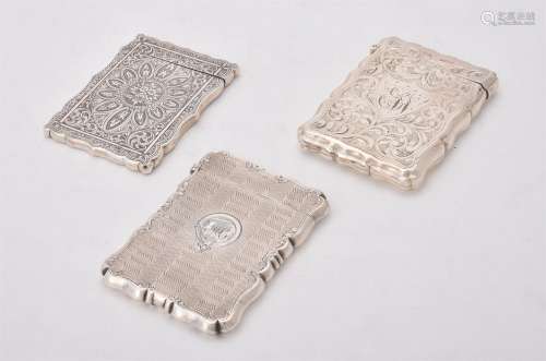 An Edwardian silver shaped rectangular card case by Jones & ...